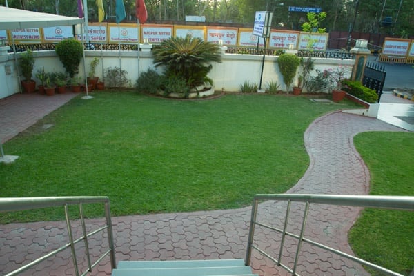 Garden pathway and greenery at The Majestic Manor